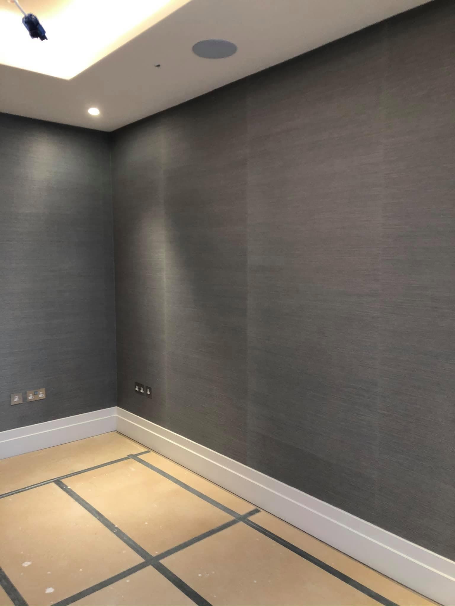 Fabric wallpaper swatches in grasscloth, linen and silk-effect textures